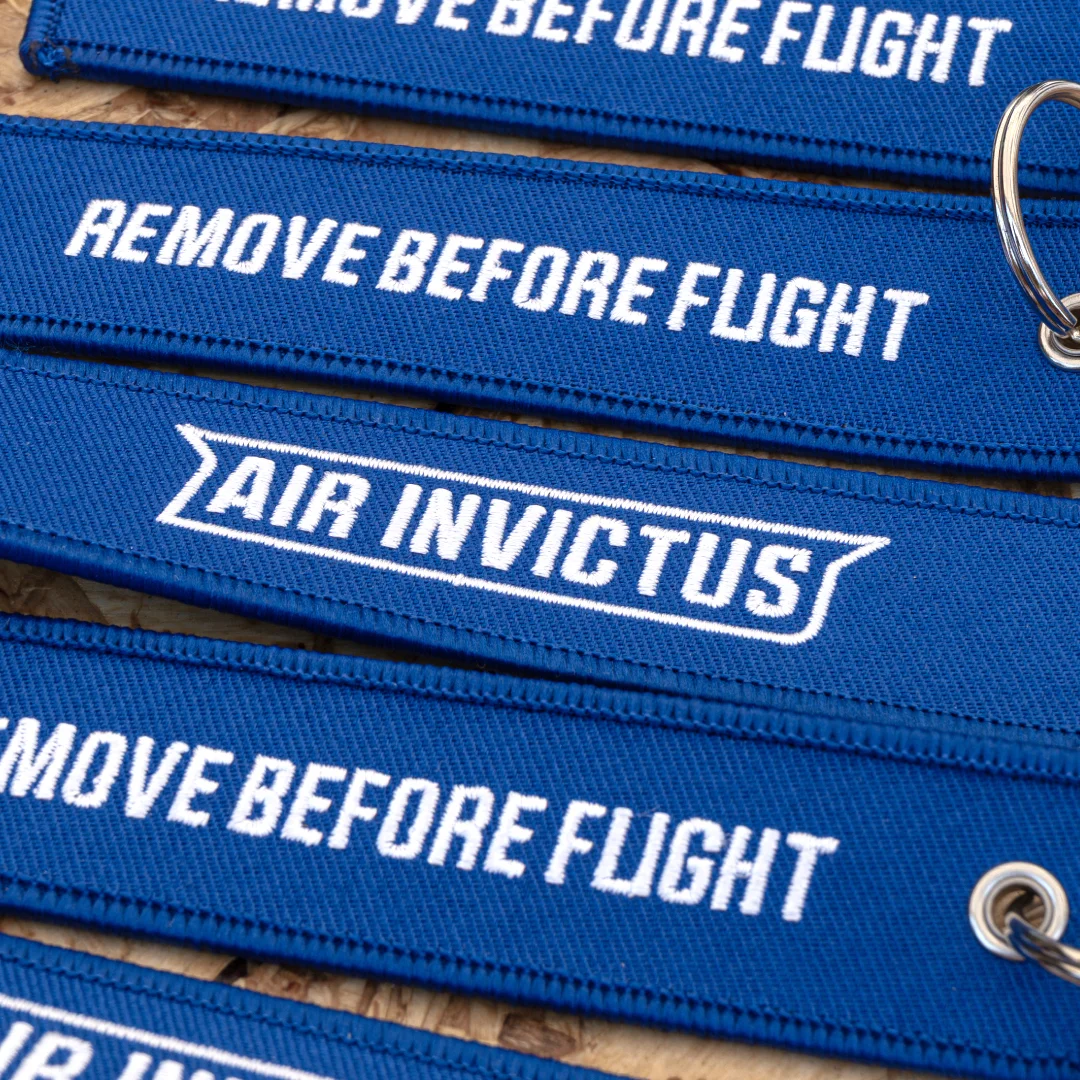 Nhdesign project Air Invictus: Brand identity applied to a promotional accessory
