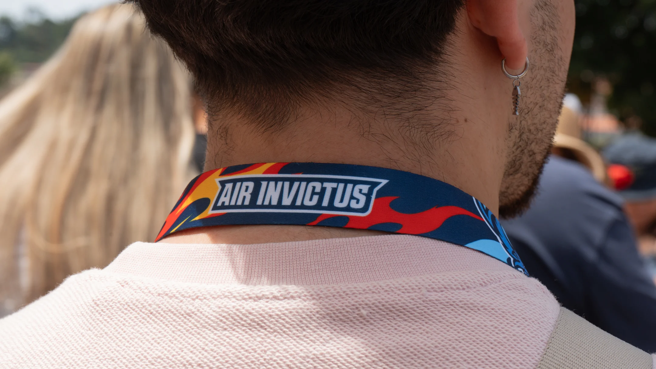 Nhdesign project Air Invictus: Brand identity applied to event lanyard