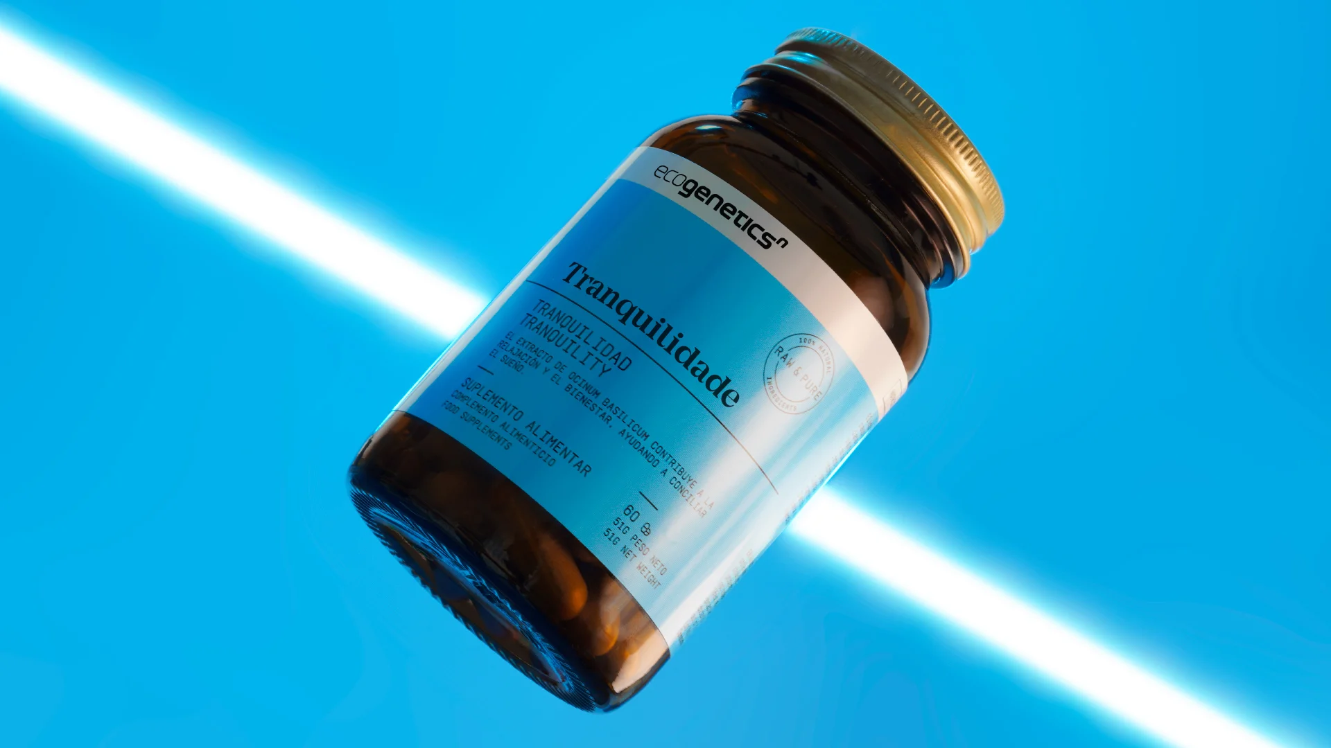 Nhdesign project EcogeneticsN: Photo of the tranquilidade bottle suspended with a blue background.