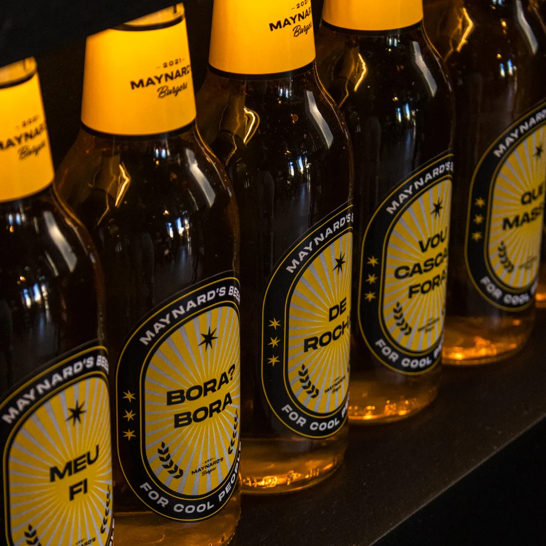 Nhdesign project Maynard's Burgers: Set of bottles with consistent visual identity