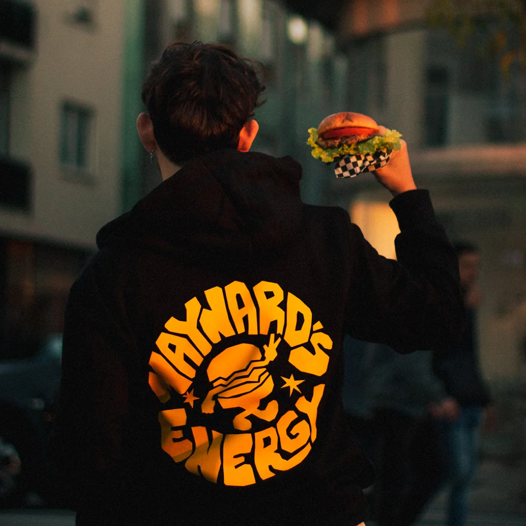 Nhdesign project Maynard's Burgers: Brand applied on apparel with a bold graphic language