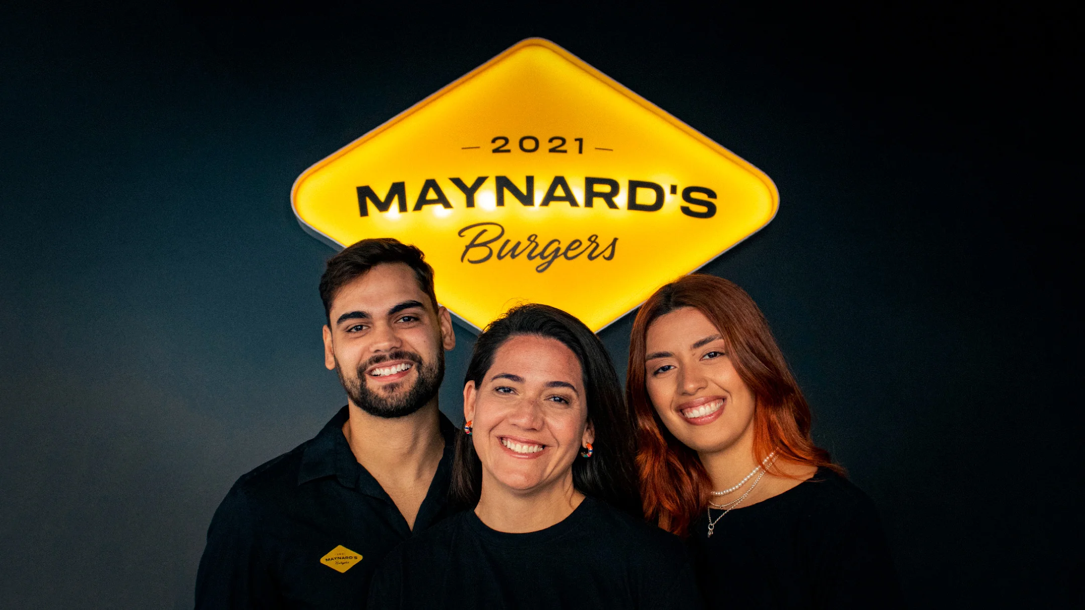 Nhdesign project Maynard's Burgers: Final image with team and brand identity highlighted