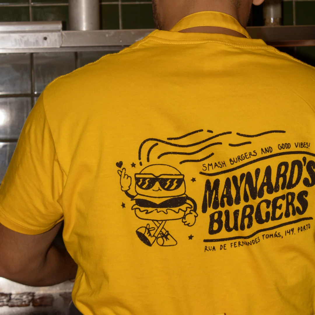 Nhdesign project Maynard's Burgers: Team member wearing branded uniform