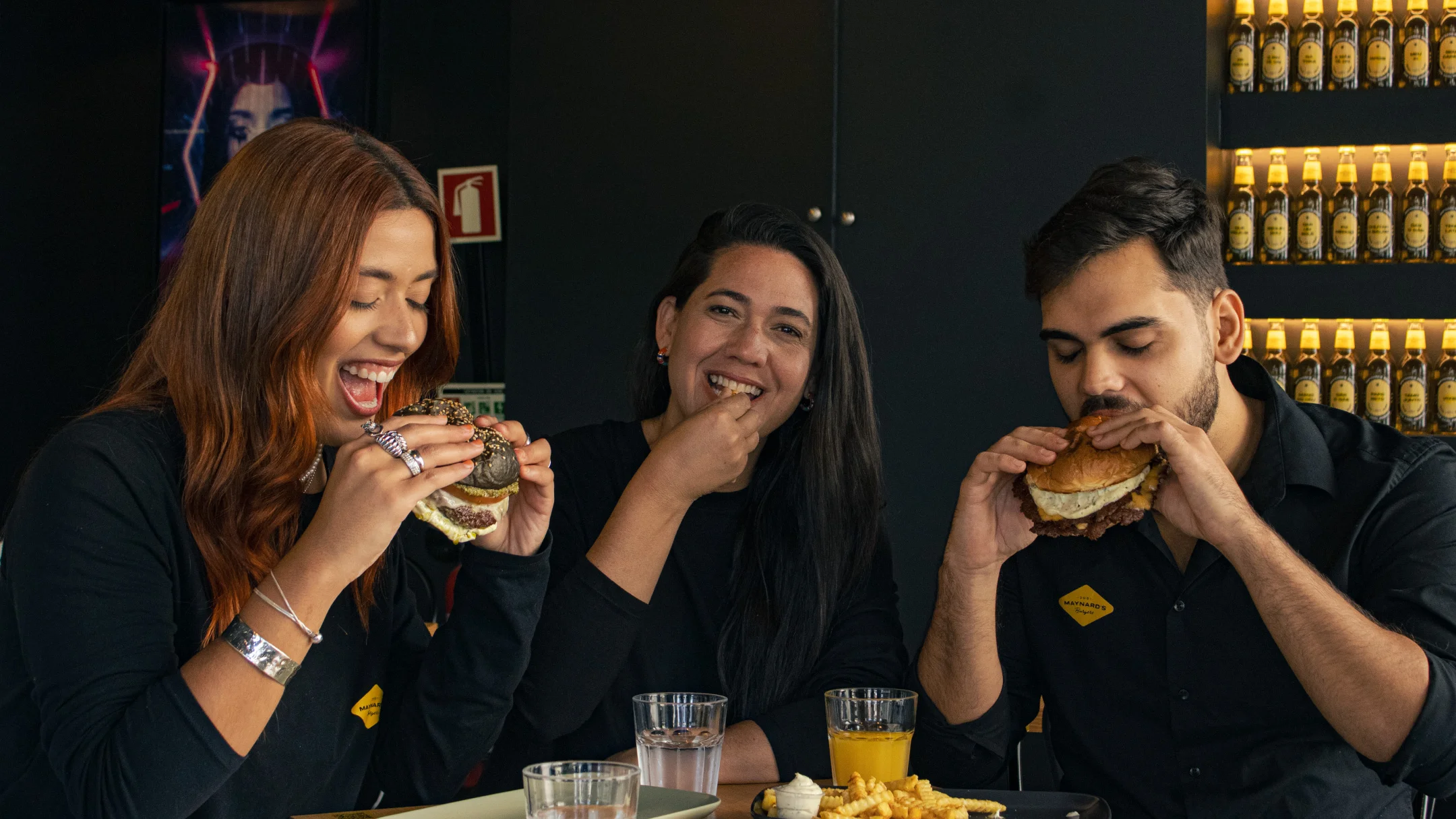 Nhdesign project Maynard's Burgers: Group in a social moment, reinforcing the brand character