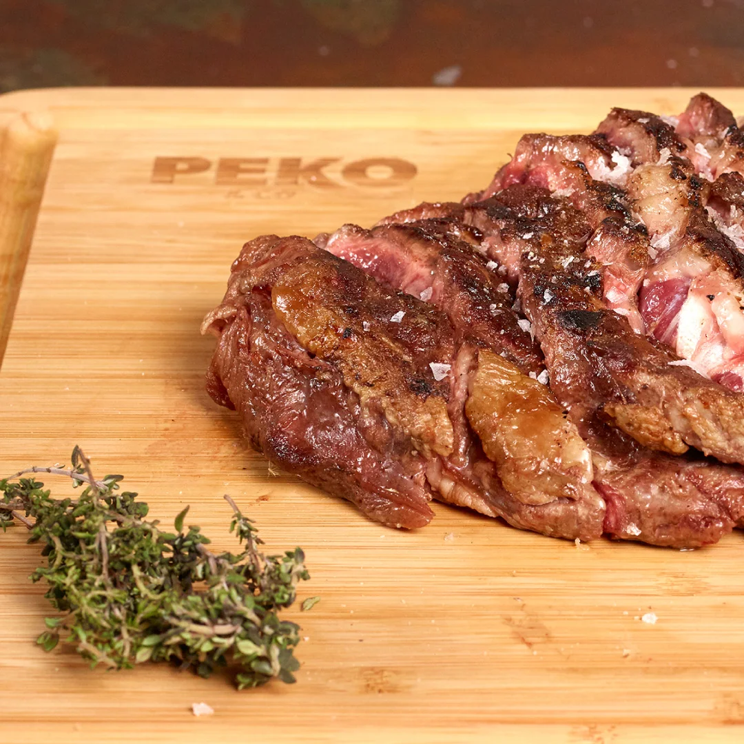 Nhdesign project PEKO & Co.: Professional Chef Bamboo Cutting Board with Peko's logo