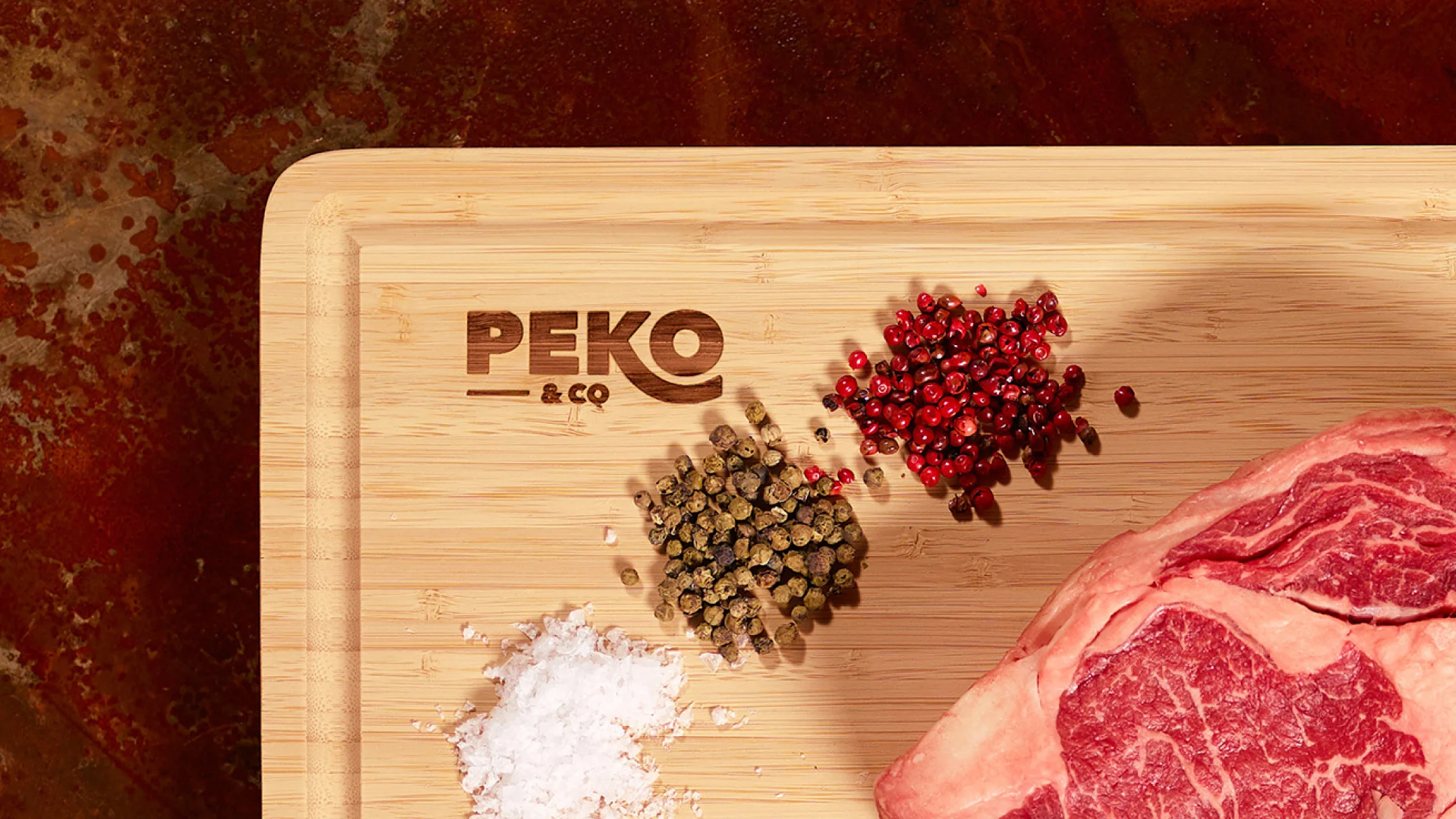 Nhdesign project PEKO & Co.: Professional Chef Bamboo Cutting Board with Peko's logo