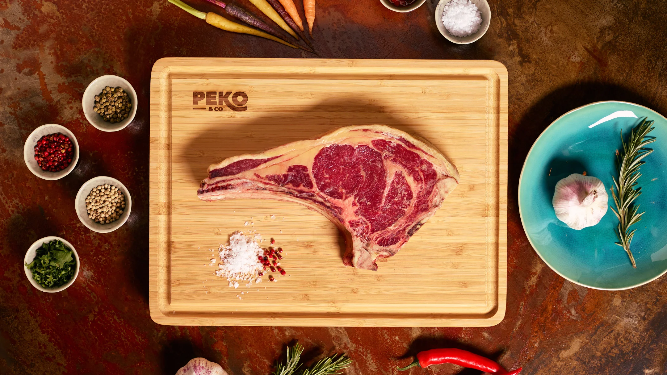 Nhdesign project PEKO & Co.: Professional Chef Bamboo Cutting Board with Peko's logo