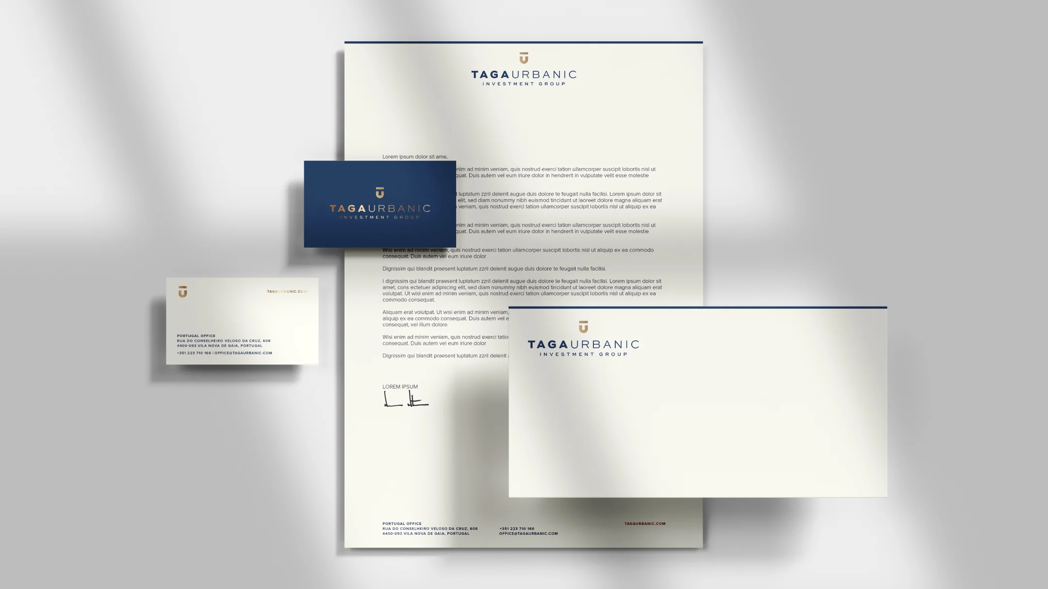 Nhdesign project Taga Urbanic: Image of Taga Urbanic's stationery on a light background: business cards, envelopes, and letterhead.