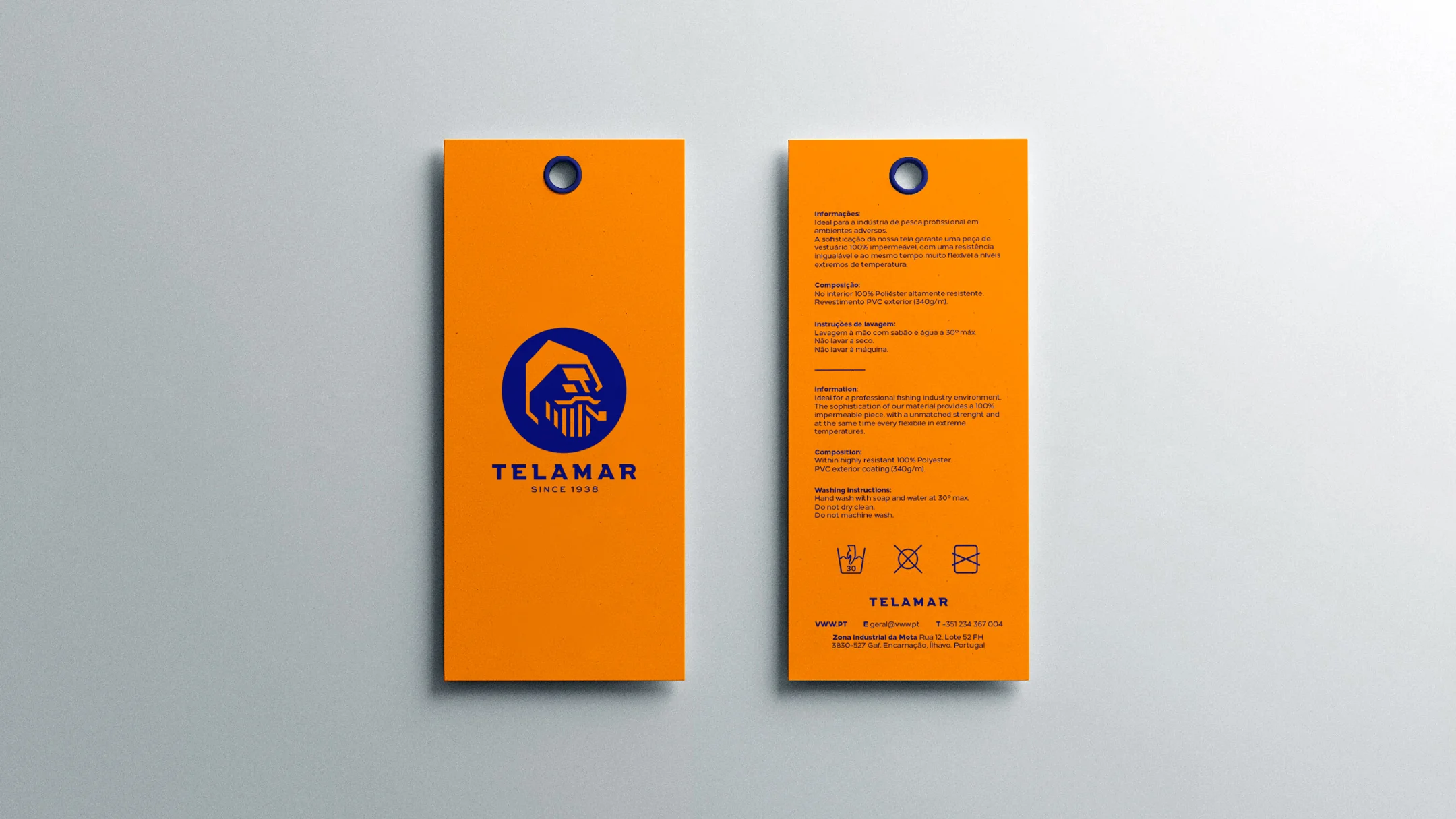 Projeto Telamar da Nhdesign: Frente e verso de etiqueta da telemar sobre um fundo cizento.