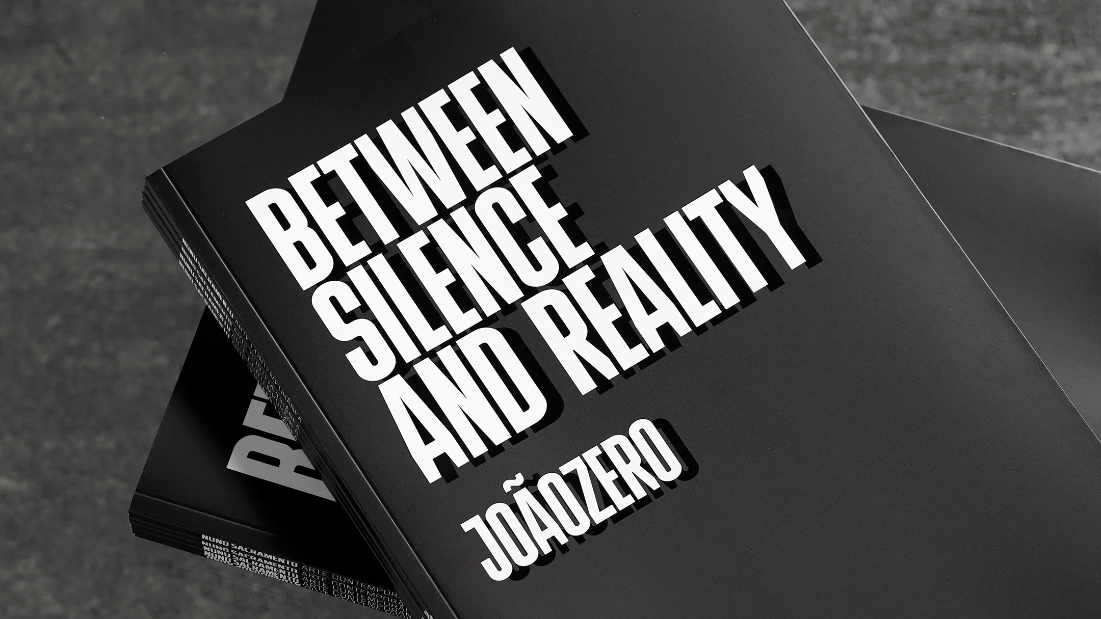 Nhdesign project Between Silence and Reality: Cover of the João Zero catalog