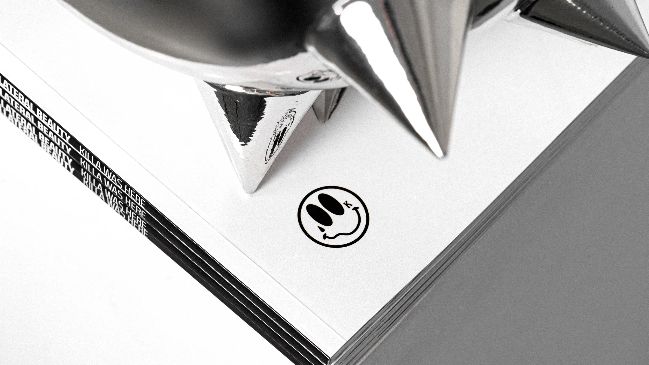Nhdesign project Collateral Beauty: Detail of the editorial finishing of the Killa Was Here catalogue