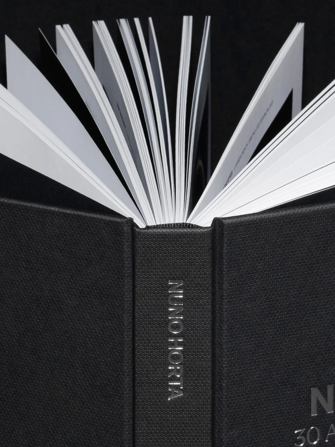 Nhdesign project 30 Anos de Fotografia: Detail of the spine of Nuno Horta's 30 Years of Photography commemorative book