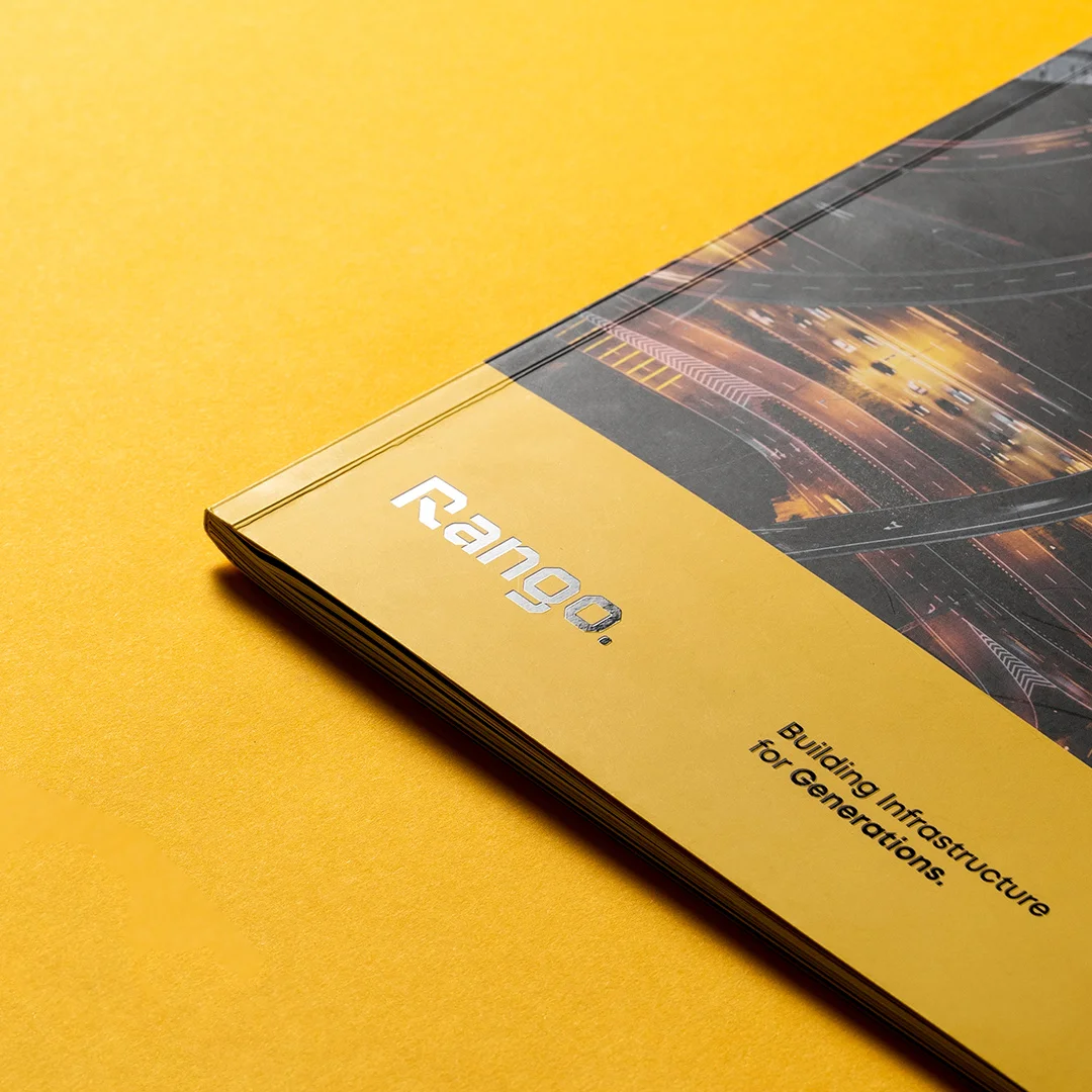 Nhdesign project Rango Company Profile: Side view of the company profile with cover and back cover visible.